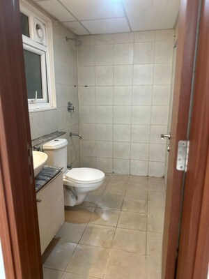 Bathroom in 2 BHK Apartment at Bhartiya City Nikoo Homes II, Thanisandra Main Road – for Rent
