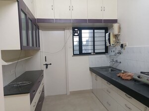 Kitchen in 2 BHK Apartment at Aundh Gaon – for Rent
