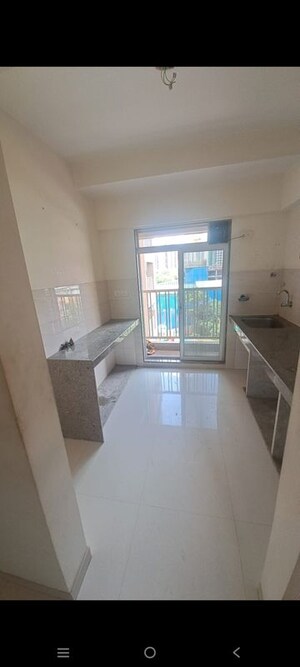 Living Room in 1 BHK Apartment at Metropolis Rivera, Kasarvadavali – for Rent