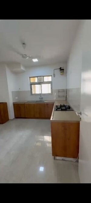 Kitchen in 3 BHK Apartment at Hiranandani Estate Rodas Enclave, Ghodbunder Road – for Rent