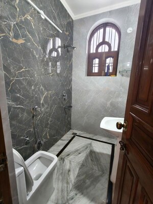 Bathroom in 4 BHK Builder Floor at Ansal Sushant Lok I, Sector 43 – for Rent