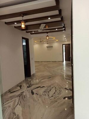 Bedroom in 4 BHK Builder Floor at Ansal Sushant Lok I, Sector 43 – for Rent