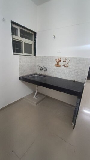 Bathroom in 2 BHK Apartment at Raj Heramba Venkatesh Imperia, Tathawade – for Rent