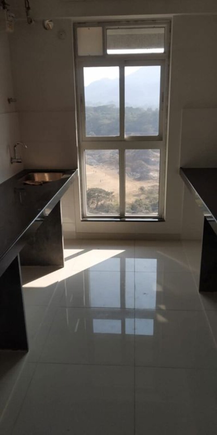 Kitchen, godrej-emerald 2 Bedroom 721 Sq.Ft. Apartment In Ghodbunder Road Thane 10460270