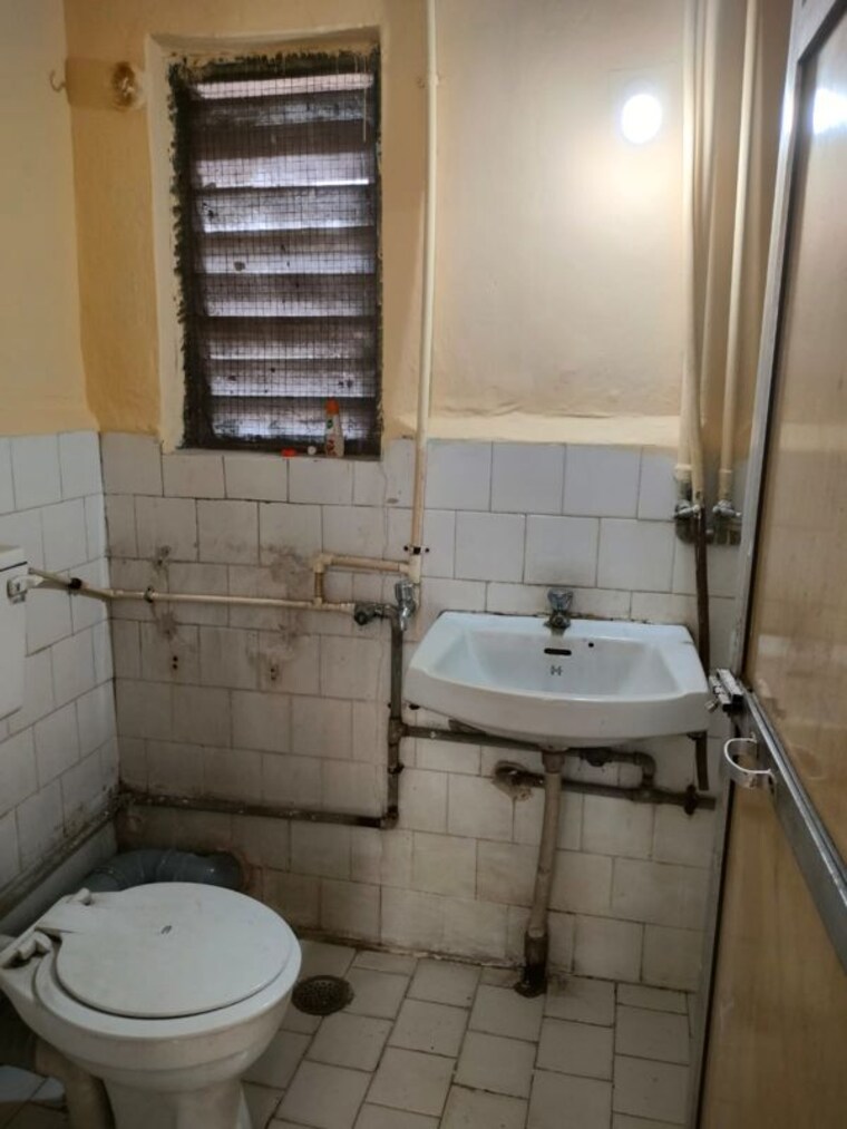 Bathroom, brindaban-mathura-chs 2 Bedroom 745 Sq.Ft. Apartment In Vrindavan Society Thane 10460301