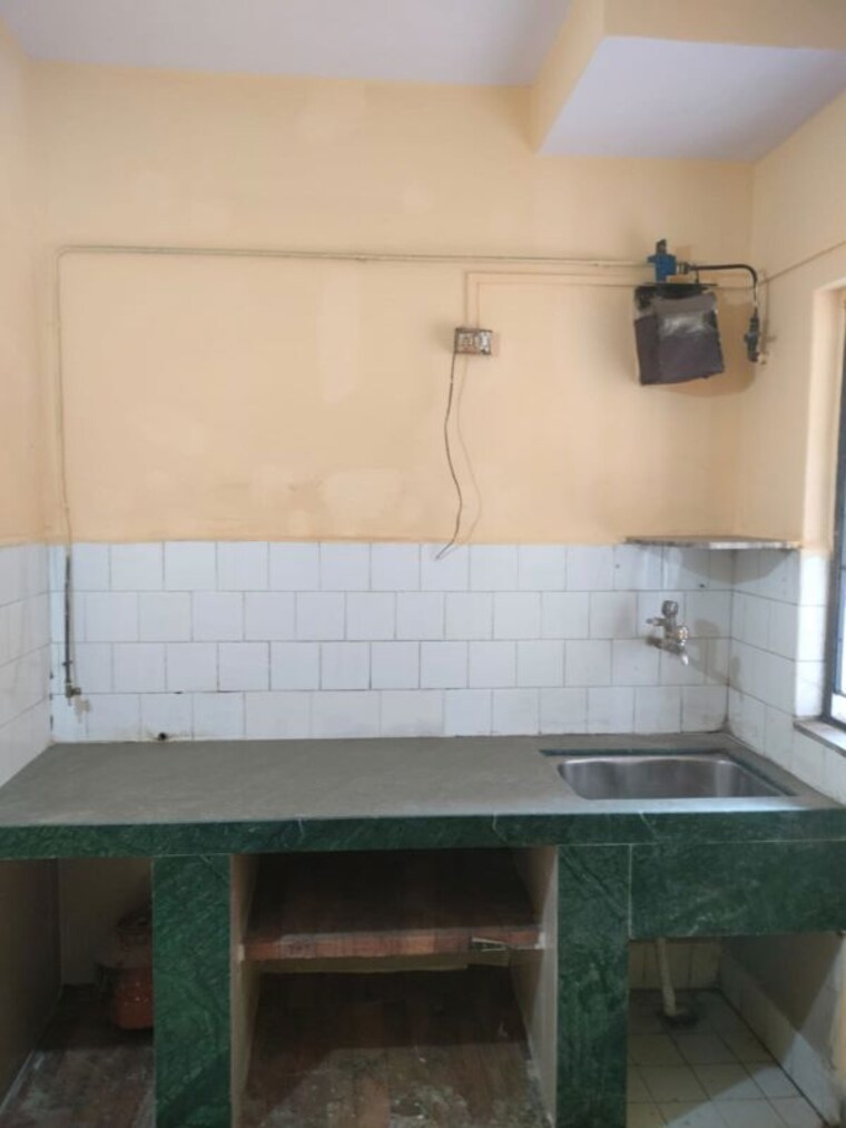 Kitchen, brindaban-mathura-chs 2 Bedroom 745 Sq.Ft. Apartment In Vrindavan Society Thane 10460301