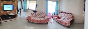 Living Room in 2 BHK Apartment at Millennium Acropolis, Wakad – for Sale