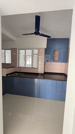Kitchen in 2 BHK Apartment at NG Rathi Palm Nest, Wagholi – for Rent