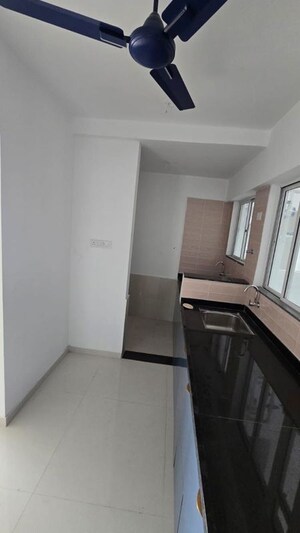 Kitchen in 2 BHK Apartment at NG Rathi Palm Nest, Wagholi – for Rent