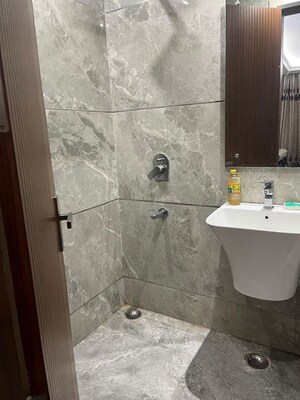 Bathroom in 4 BHK Builder Floor at Safdarjung Development Area – for Rent