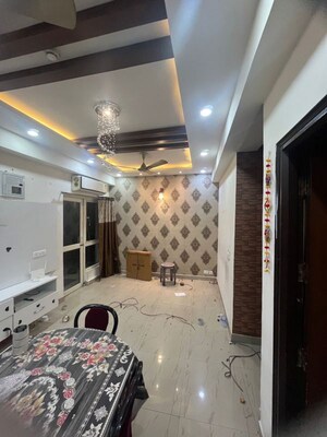 Team Area in 2.5 BHK Apartment at Nimbus The Golden Palm, Sector 168 – for Rent