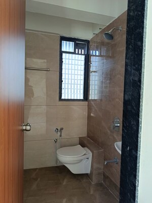 Bathroom in 3 BHK Apartment at Godrej Garden City, Jagatpur – for Rent