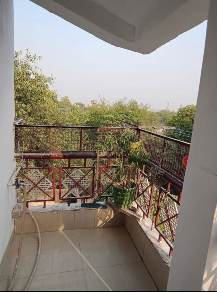 Balcony, rwa-apartments-sector-26 2.5 Bedroom 850 Sq.Ft. Builder Floor In Sector 26 Noida 10460857
