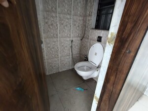 Bathroom in  Shop at Ellora Fiesta, Sanpada – for Sale
