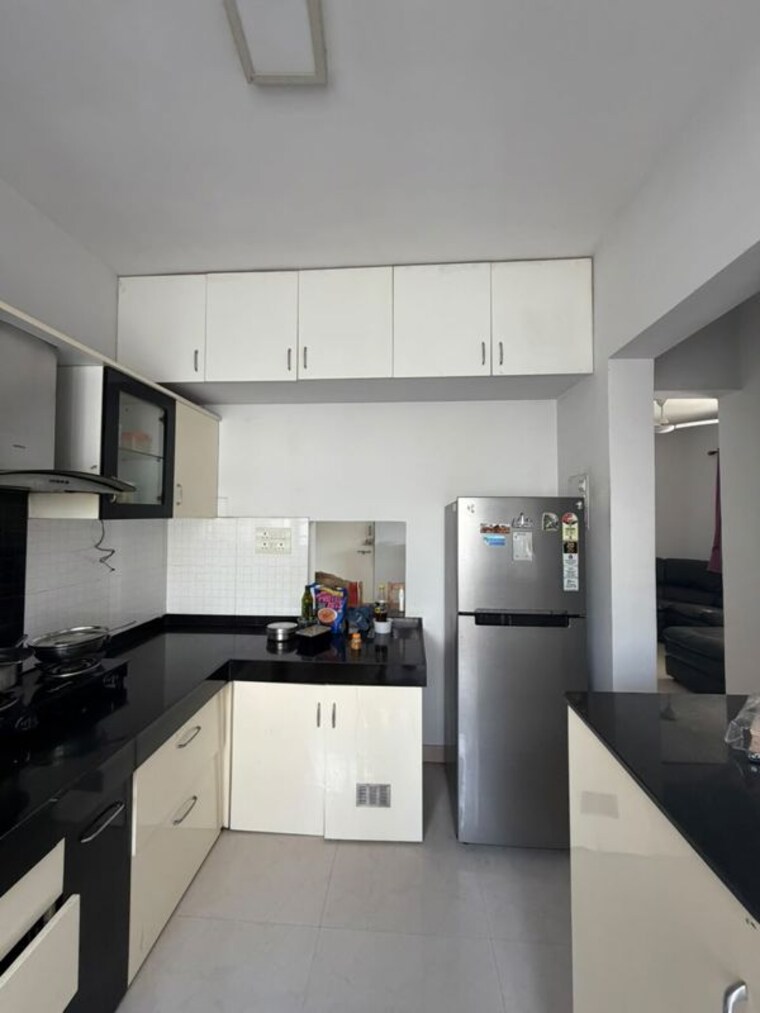Kitchen, magarpatta-daffodils-apartment 2 Bedroom 850 Sq.Ft. Apartment In Hadapsar Pune 10460930