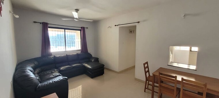 Living Room, magarpatta-daffodils-apartment 2 Bedroom 850 Sq.Ft. Apartment In Hadapsar Pune 10460930