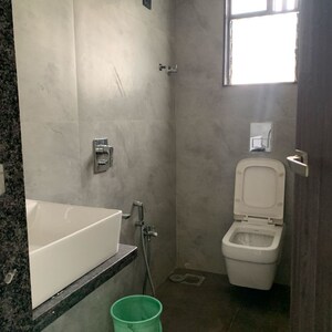 Bathroom in 2 BHK Apartment at Kasturi Milan, Kastur Park – for Rent