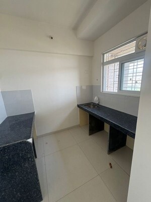 Kitchen in 1 BHK Apartment at Ashar Arize, Kalwa – for Rent