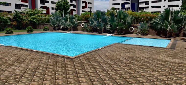 Swimming Pool, kumar-pebble-park 4 Bedroom 1415 Sq.Ft. Apartment In Hadapsar Pune 10461093