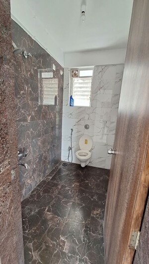 Washroom in 2 BHK Apartment at Kamgar Putala Vasahat – for Sale