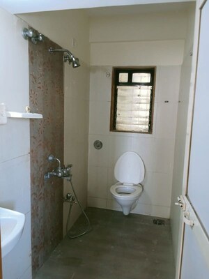 Bathroom in 1.5 BHK Apartment at Puranik Hometown, Ghodbunder Road – for Rent