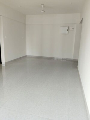 Living Room in 2 BHK Apartment at Atmiya Centria, Santacruz East – for Rent