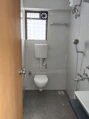 Bathroom in 2 BHK Apartment at Atmiya Centria, Santacruz East – for Rent