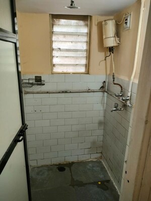 Bathroom in 1 BHK Apartment at Brindaban Mathura CHS, Vrindavan Society – for Sale
