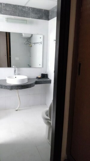 Bathroom in 4 BHK Apartment at Satya The Hermitage, Sector 103 – for Rent