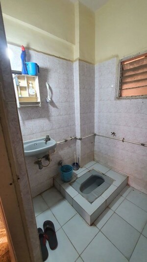 Bathroom in 1 BHK Apartment at Rutu Enclave, Kasarvadavali – for Rent
