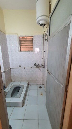 Bathroom in 1 BHK Apartment at Rutu Enclave, Kasarvadavali – for Rent