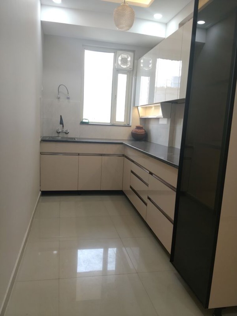 Kitchen, pyramid-midtown 2 Bedroom 700 Sq.Ft. Apartment In Sector 59 Gurgaon 10461433