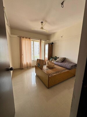 Bedroom in 2 BHK Apartment at Gini Bellissimo, Dhanori – for Rent