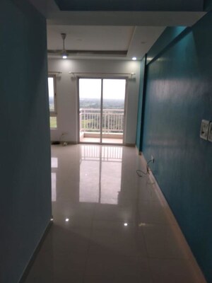 Building Lobby in 3 BHK Apartment at Elita Garden Vista, New Town – for Rent