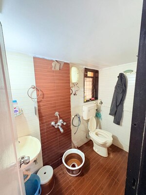 Bathroom in 2 BHK Apartment at Raj Exotica, Mira Road – for Rent