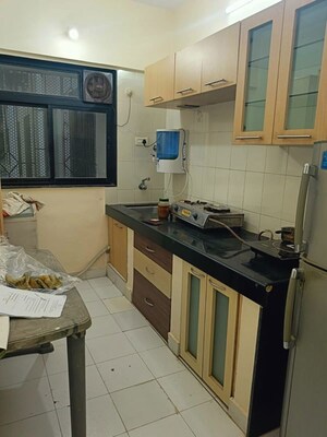 Kitchen in 1 BHK Apartment at Mantri Park, Goregaon East – for Rent
