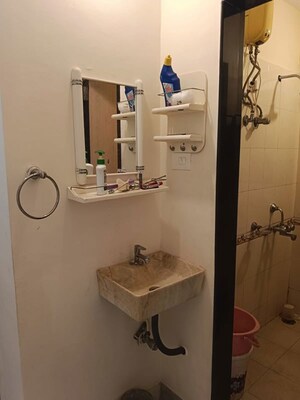 Bathroom in 1 BHK Apartment at Mantri Park, Goregaon East – for Rent