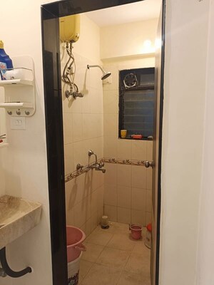 Bathroom in 1 BHK Apartment at Mantri Park, Goregaon East – for Rent