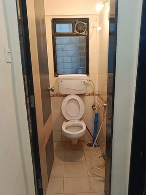 Bathroom in 1 BHK Apartment at Mantri Park, Goregaon East – for Rent