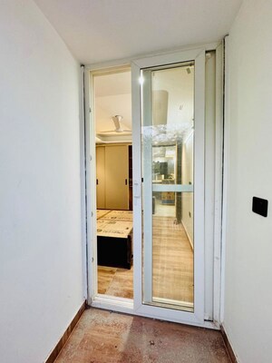 Building Lobby in 1 BHK Apartment at Sainik Farm – for Rent