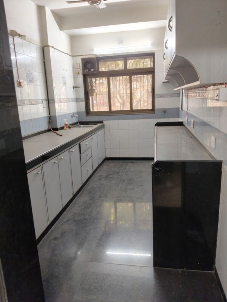 Kitchen, venus-chs-andheri 3 Bedroom 1050 Sq.Ft. Apartment In Andheri West Mumbai 10462050