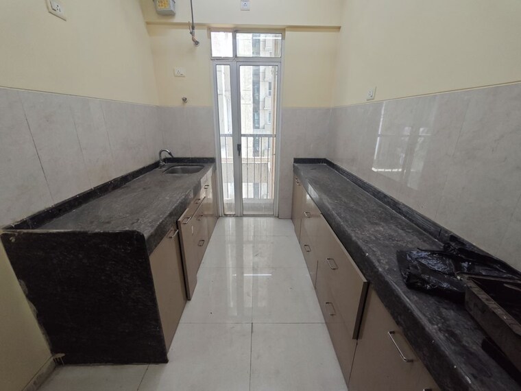 Kitchen, marathon-nexzone-antilia 2 Bedroom 1246 Sq.Ft. Apartment In New Panvel Navi Mumbai 10441213