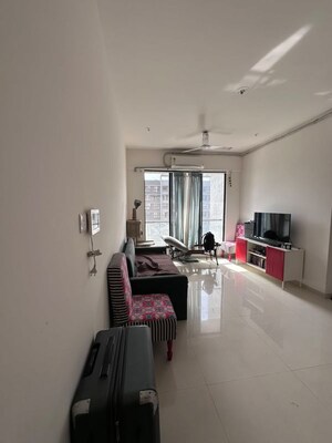Living Room in 2 BHK Apartment at Ajmera Beverly Hills and Royal Empire, Andheri West – for Sale