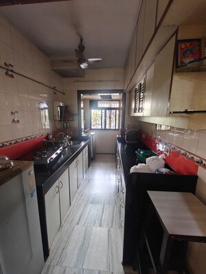 Kitchen in 2 BHK Apartment at Montreal Tower, Andheri West – for Sale
