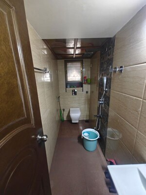 Bathroom in 2 BHK Apartment at Montreal Tower, Andheri West – for Sale