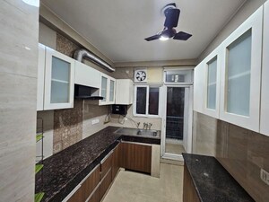 Kitchen in 4 BHK Apartment at Kalpataru Vista, Sector 128 – for Rent