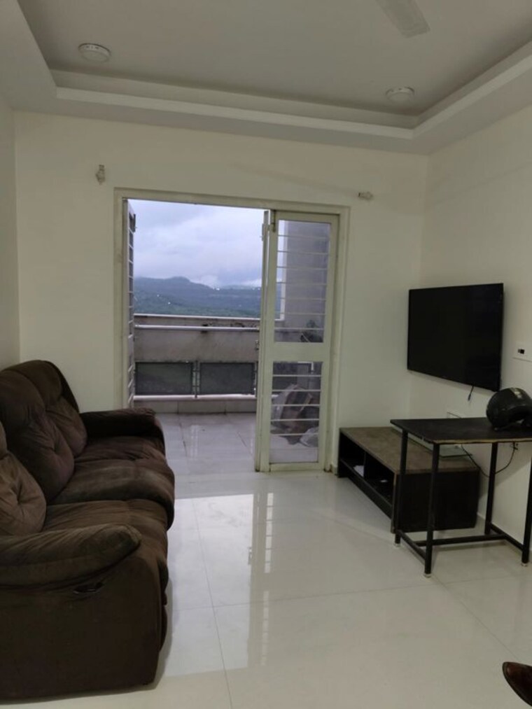 Living Room, ganga-legend 2 Bedroom 666 Sq.Ft. Apartment In Bavdhan Pune 10462297