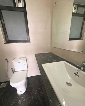 Bathroom in 2 BHK Apartment at Prescon Midtown Bay, Mahim West – for Rent