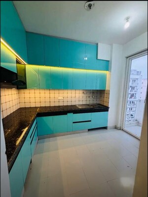 Kitchen in 2 BHK Apartment at Urban Axis Urban Woods, Sushant Golf City – for Rent