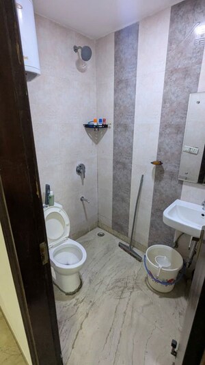 Bathroom in 3 BHK Builder Floor at Green Park Extension – for Rent